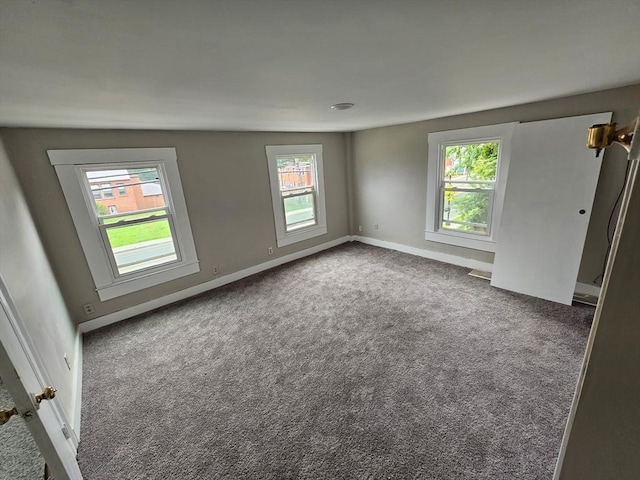 48-50 S Westfield St, Agawam, MA 01030 - carpeted empty room with baseboards
