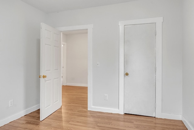 unfurnished bedroom featuring light hardwood / wood-style floors