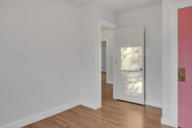 spare room with light hardwood / wood-style flooring