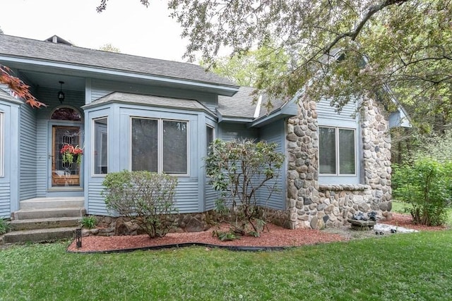 view of property exterior featuring a yard