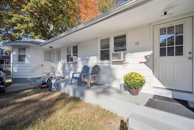 property entrance featuring cooling unit