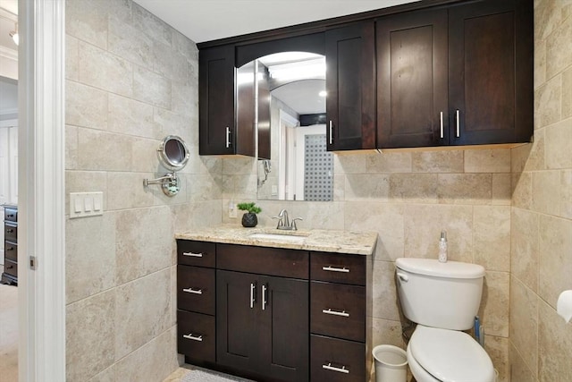 644 Stony Hill Rd, Wilbraham, MA 01095 - bathroom with vanity and tile walls