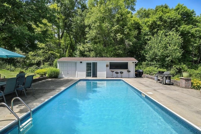 644 Stony Hill Rd, Wilbraham, MA 01095 - swimming pool featuring a patio, area for grilling, and an outdoor structure