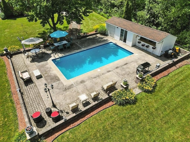 644 Stony Hill Rd, Wilbraham, MA 01095 - outdoor pool featuring a patio, a lawn, and an outbuilding