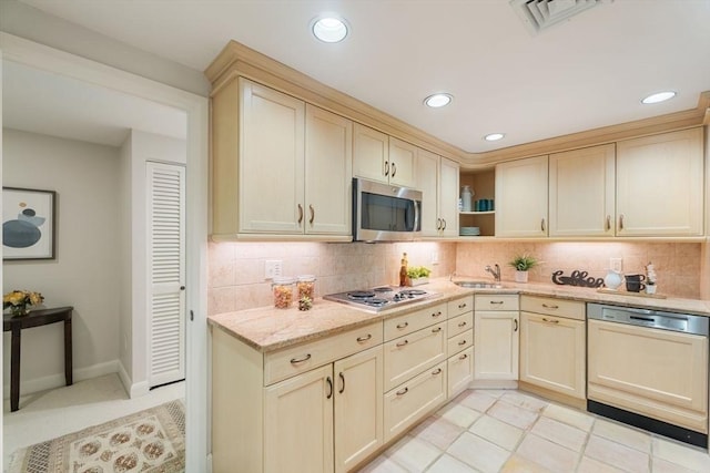 kitchen featuring open shelves, appliances with stainless steel finishes, recessed lighting, tasteful backsplash, and visible vents