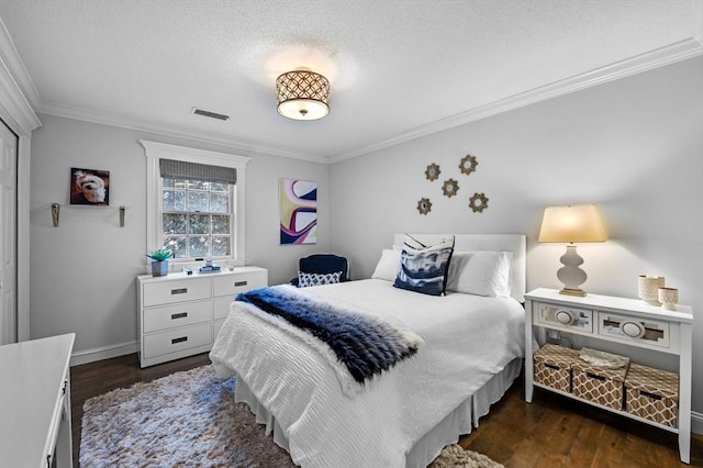 71 Weatherly Unit 71, Salem, MA 01970 - bedroom with ornamental molding, wood finished floors, a textured ceiling, and baseboards
