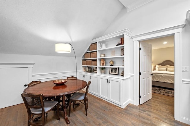 71 Weatherly Unit 71, Salem, MA 01970 - dining area featuring lofted ceiling, wood finished floors, and built in features
