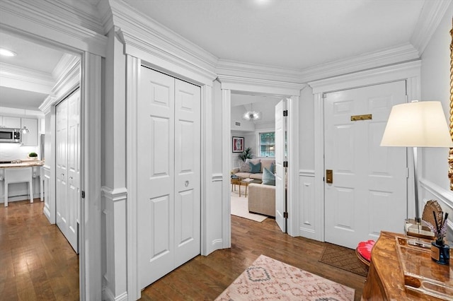 71 Weatherly Unit 71, Salem, MA 01970 - foyer entrance featuring dark wood finished floors and crown molding