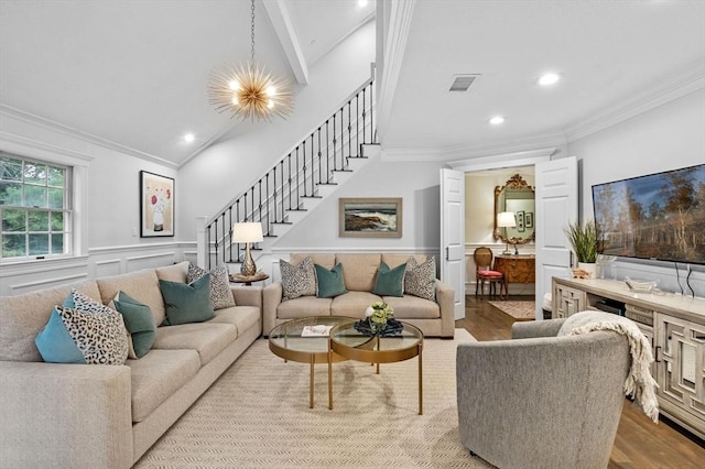 71 Weatherly Unit 71, Salem, MA 01970 - living room with wood finished floors, stairs, crown molding, recessed lighting, and wainscoting