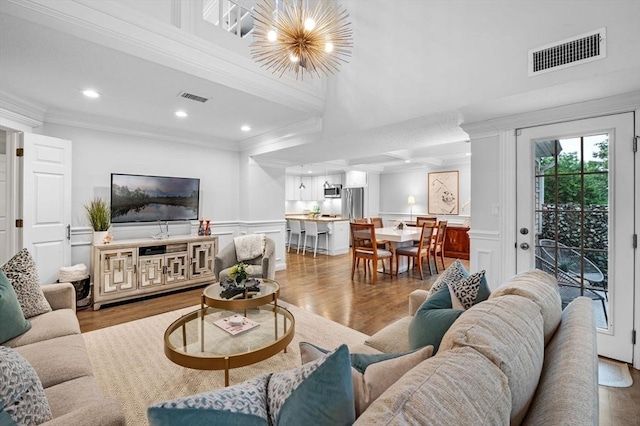 71 Weatherly Unit 71, Salem, MA 01970 - living area featuring ornamental molding, a decorative wall, wood finished floors, recessed lighting, and wainscoting
