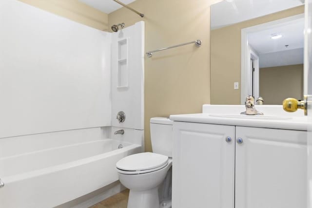 full bathroom featuring shower / bath combination, vanity, and toilet