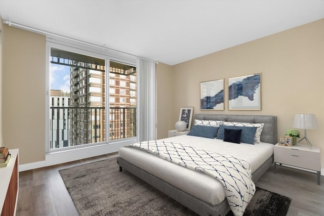 bedroom featuring dark wood-type flooring