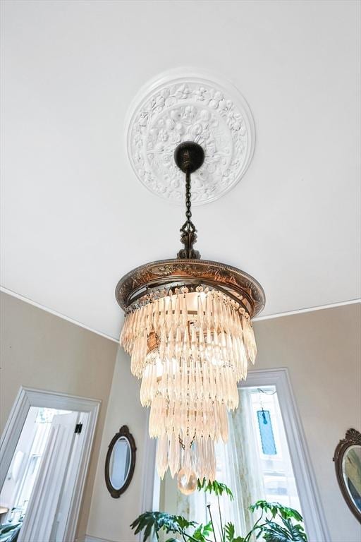 details with an inviting chandelier