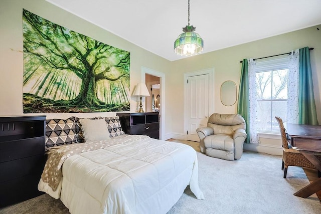 bedroom featuring baseboards and carpet floors