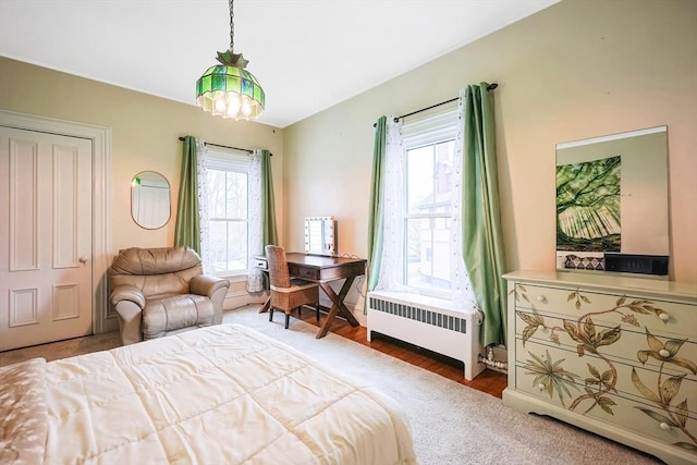 bedroom with radiator heating unit