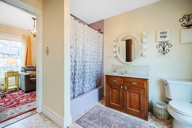 full bath with vanity, toilet, and shower / tub combo with curtain