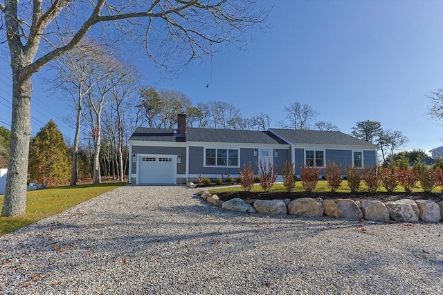 ranch-style home with a garage