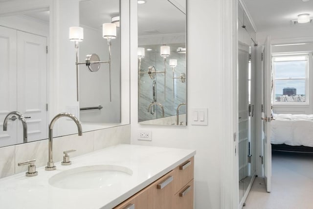 2 Commonwealth Ave Unit 15D, Boston, MA 02116 - bathroom with crown molding, a stall shower, vanity, and ensuite bathroom