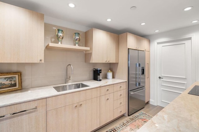 2 Commonwealth Ave Unit 15D, Boston, MA 02116 - kitchen with high quality fridge, light brown cabinets, a sink, tasteful backsplash, and recessed lighting