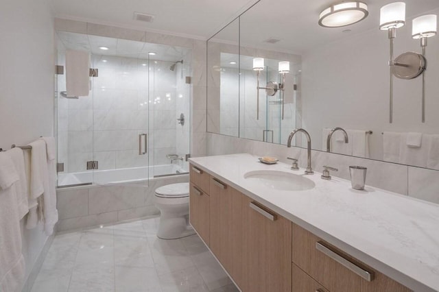 2 Commonwealth Ave Unit 15D, Boston, MA 02116 - full bathroom with tiled shower / bath combo, marble finish floors, vanity, toilet, and crown molding