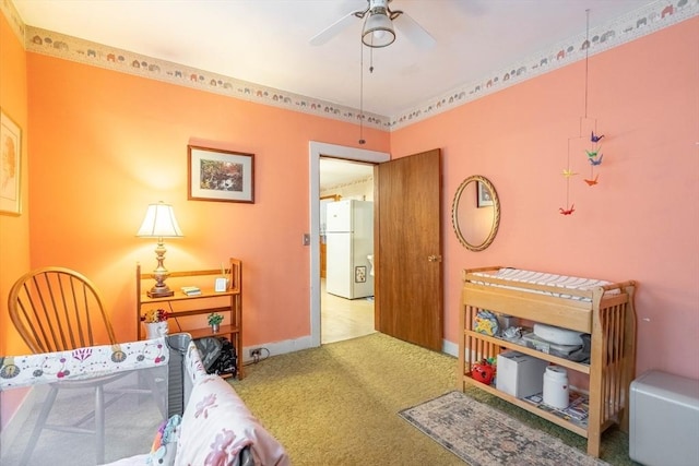 46 Pleasant St, Southbridge, MA 01550 - carpeted bedroom with freestanding refrigerator, baseboards, and a ceiling fan