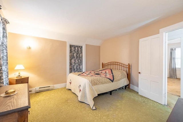 46 Pleasant St, Southbridge, MA 01550 - carpeted bedroom featuring a baseboard radiator, vaulted ceiling, and baseboards