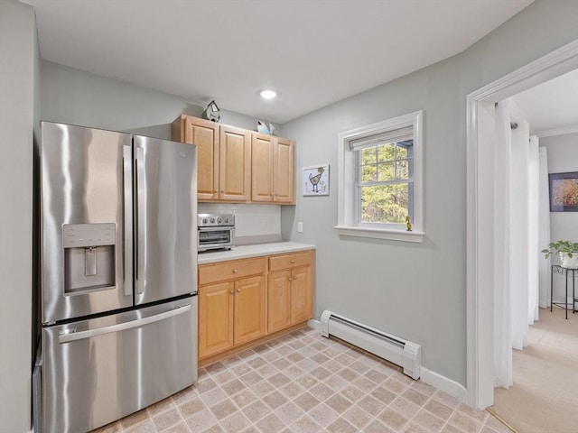 kitchen with stainless steel refrigerator with ice dispenser, baseboard heating, tasteful backsplash, and light brown cabinets