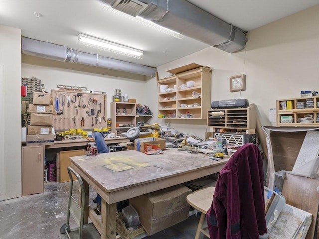 dining space with a workshop area