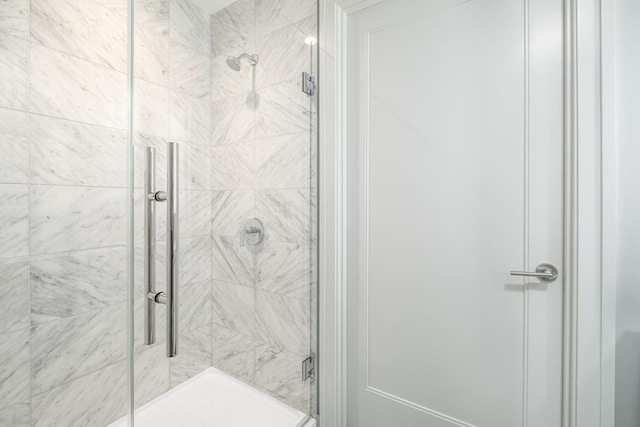 bathroom featuring walk in shower