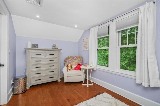 768 Plymouth St, Abington, MA 02351 - sitting room featuring vaulted ceiling, baseboards, and dark wood-style flooring