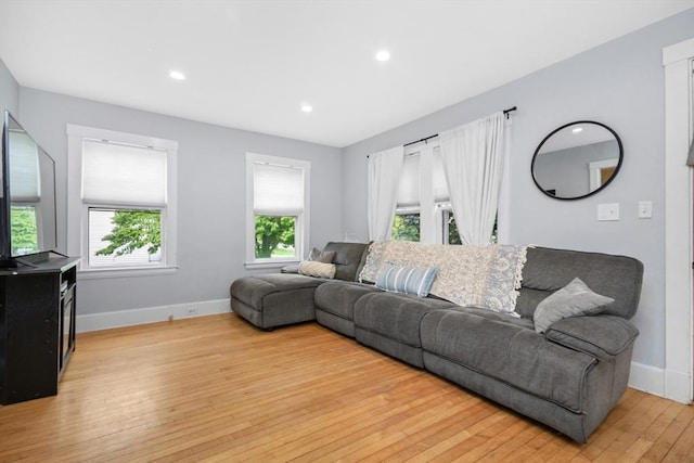 768 Plymouth St, Abington, MA 02351 - living area featuring baseboards, light wood-type flooring, and recessed lighting