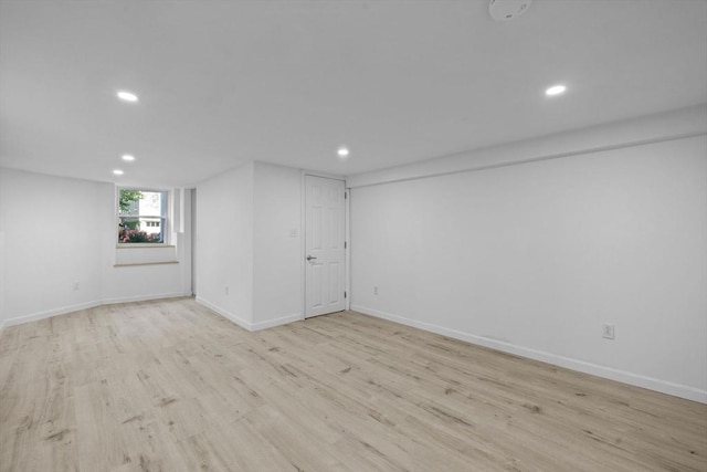 37 Fountain Rd Unit 1, Arlington, MA 02476 - below grade area featuring recessed lighting, light wood-style flooring, and baseboards