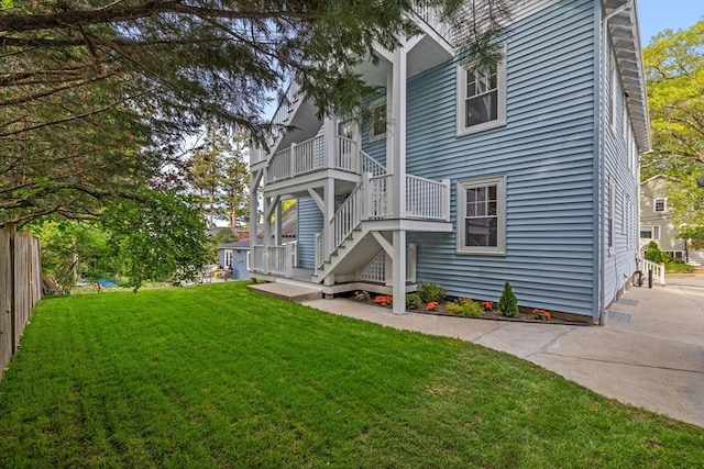 37 Fountain Rd Unit 1, Arlington, MA 02476 - rear view of property featuring a yard and stairway