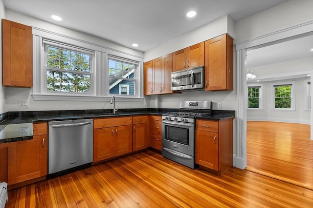 37 Fountain Rd Unit 1, Arlington, MA 02476 - kitchen with appliances with stainless steel finishes, hardwood / wood-style floors, a sink, healthy amount of natural light, and recessed lighting