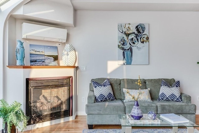 40 Oceanside Dr Unit 40, Hull, MA 02045 - living area featuring wood finished floors and arched walkways