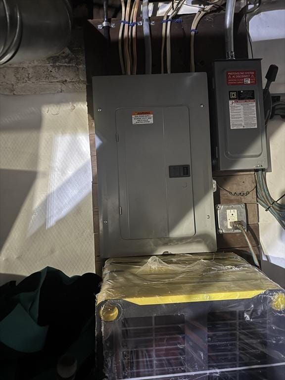 utility room with electric panel