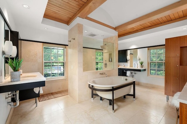 bathroom featuring wood ceiling, visible vents, and beam ceiling