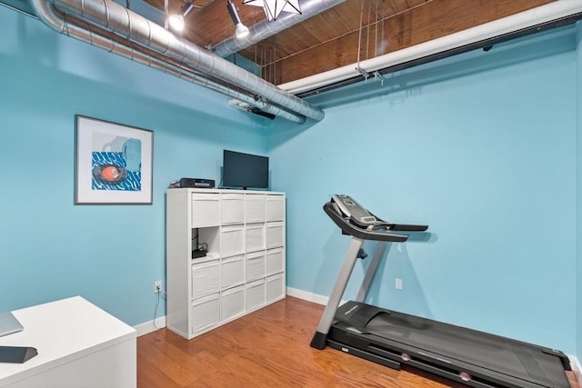 9 W Broadway Unit 311, Boston, MA 02127 - exercise room featuring wood finished floors and baseboards