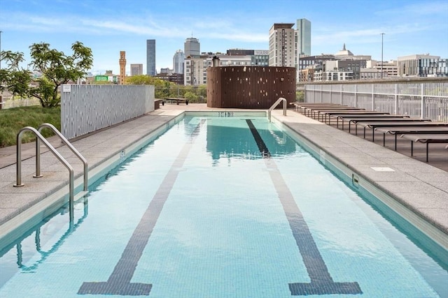 9 W Broadway Unit 311, Boston, MA 02127 - community pool featuring a skyline view