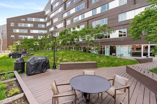 9 W Broadway Unit 311, Boston, MA 02127 - deck with a grill and outdoor dining space