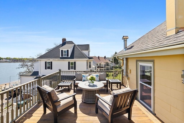 wooden deck with an outdoor living space