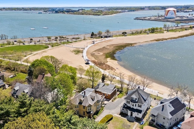 aerial view of residential area with a nearby body of water
