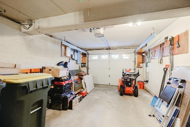 garage featuring a garage door opener