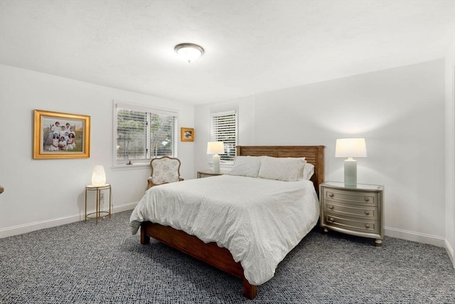 carpeted bedroom with baseboards