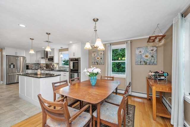 92 Gregory St, Waltham, MA 02451 - dining area featuring a chandelier, plenty of natural light, recessed lighting, and light wood-style flooring