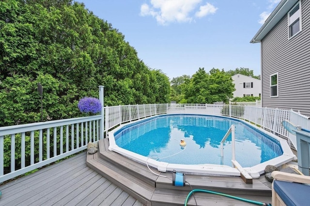 92 Gregory St, Waltham, MA 02451 - view of swimming pool with a wooden deck