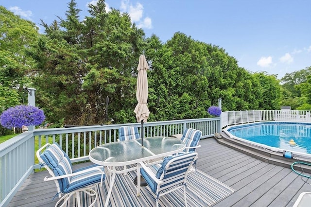 92 Gregory St, Waltham, MA 02451 - wooden terrace featuring outdoor dining space