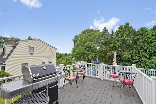 92 Gregory St, Waltham, MA 02451 - wooden deck with a grill