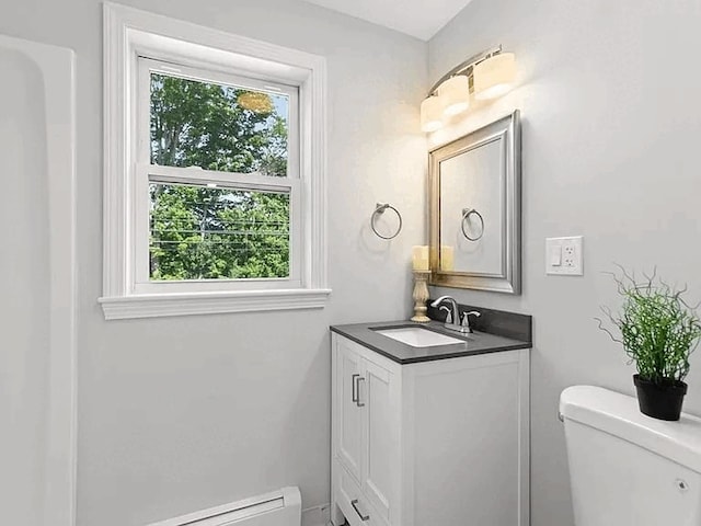 61 E Main, Merrimac, MA 01860 - bathroom featuring vanity and baseboard heating