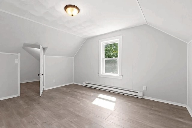 61 E Main, Merrimac, MA 01860 - additional living space featuring a baseboard heating unit, lofted ceiling, and wood finished floors